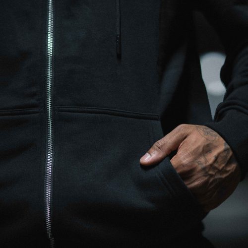 Ascend zip up black white pocket close up