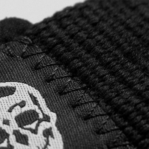 black white lifting straps skull close up